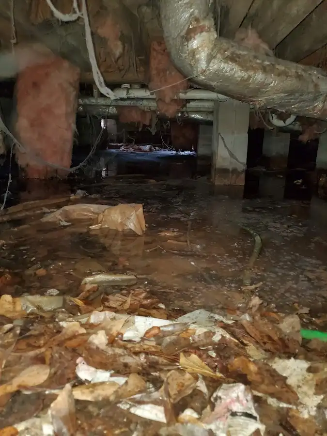 Crawl space flood assessment for Commercial Water Damage Restoration in Moore